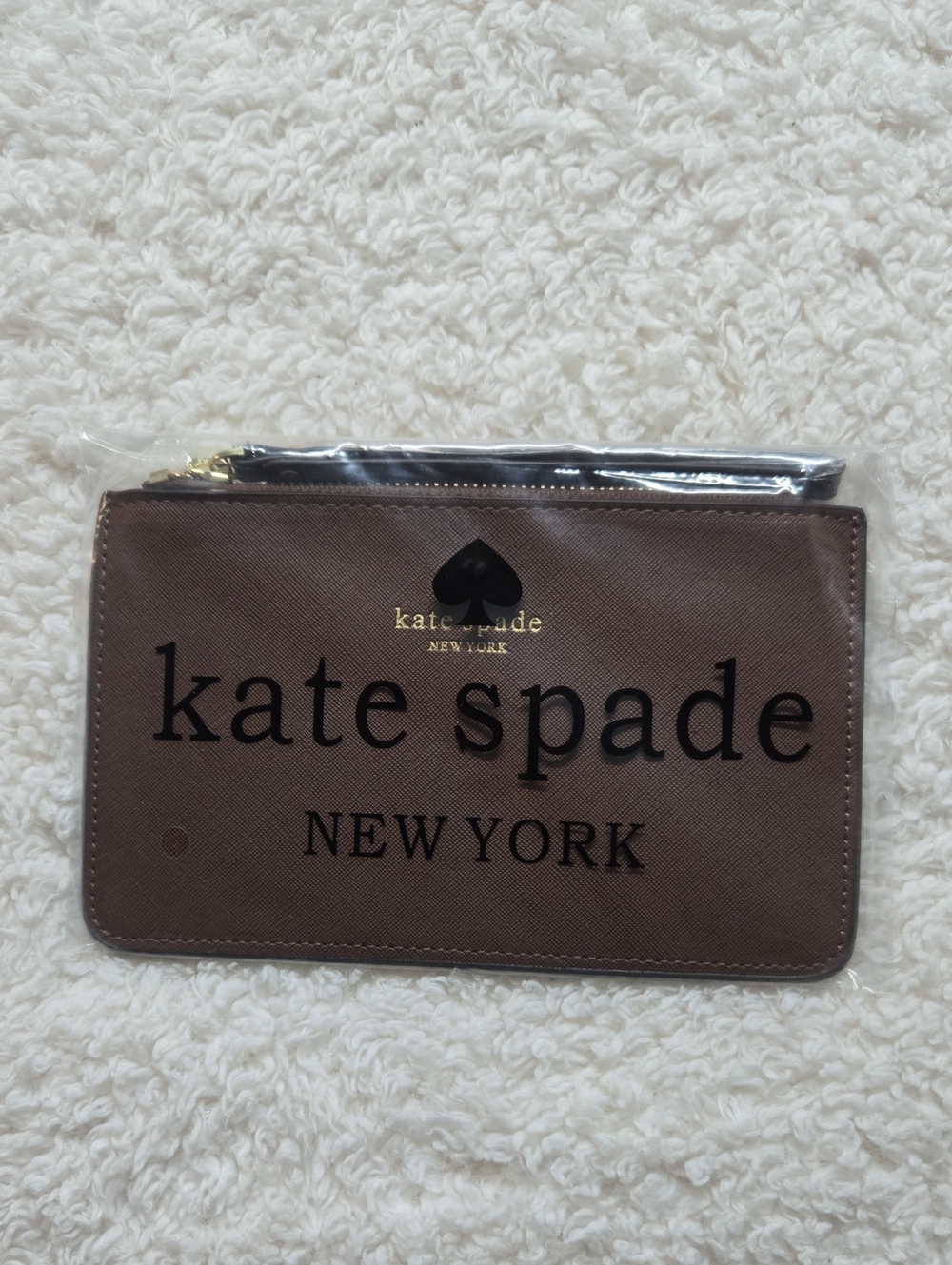kate spade brown logo zip pouch/whristler with gold-tone accent